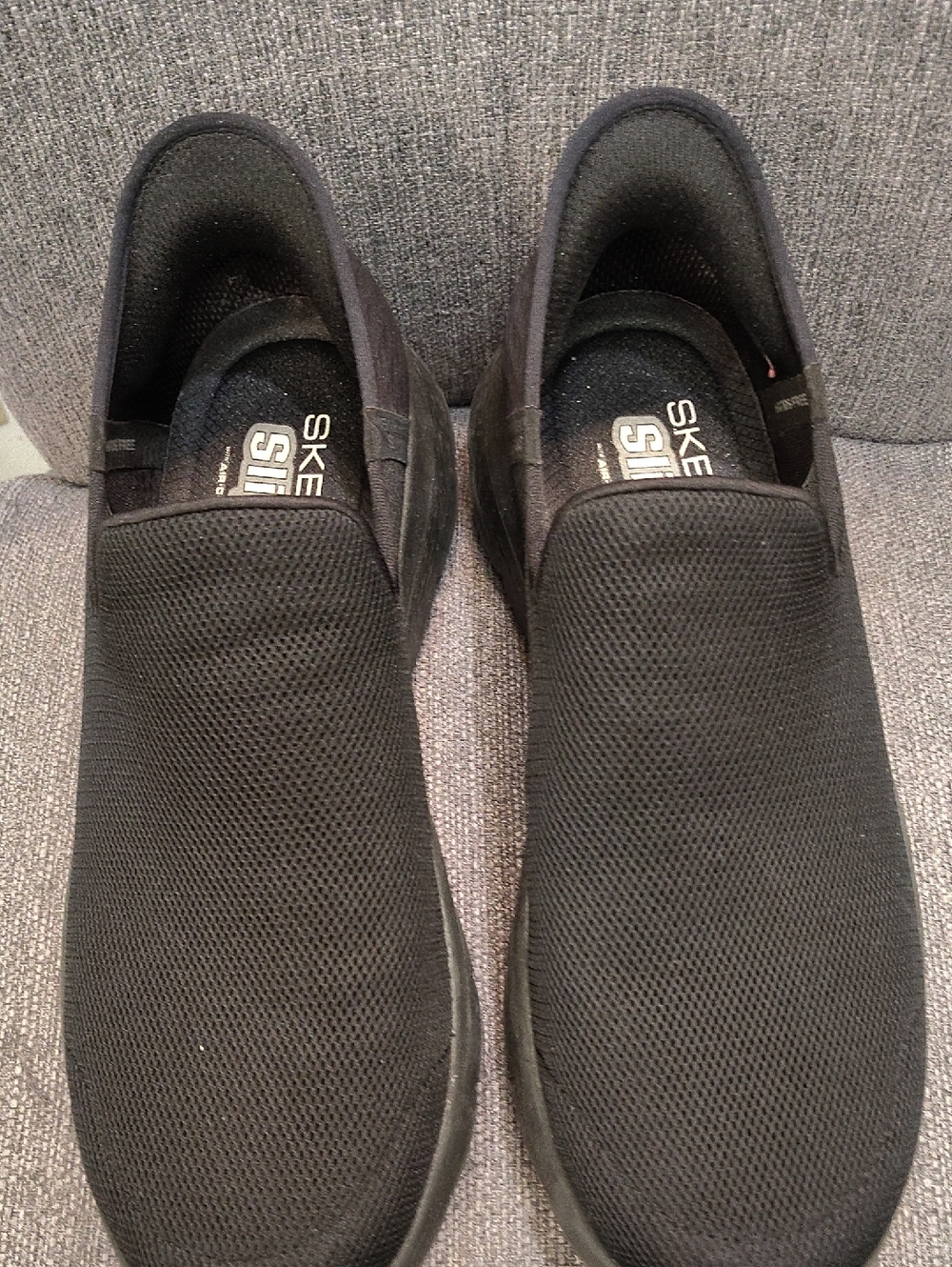 Skechers Women's Black Slip-On Mesh Sneakers